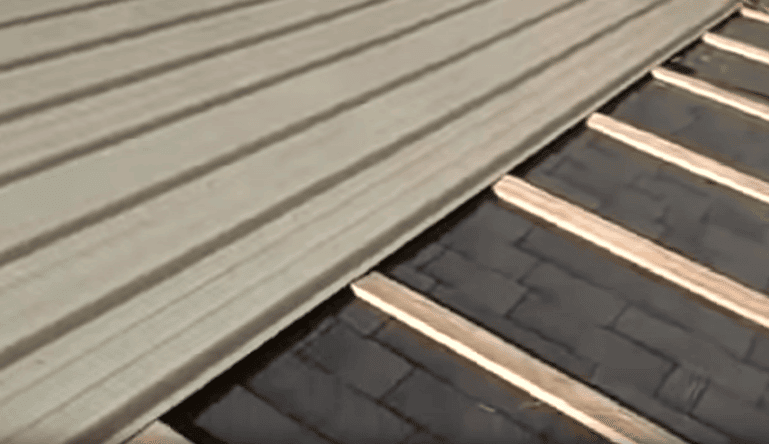 Can I install a metal roof over an existing shingle roof?