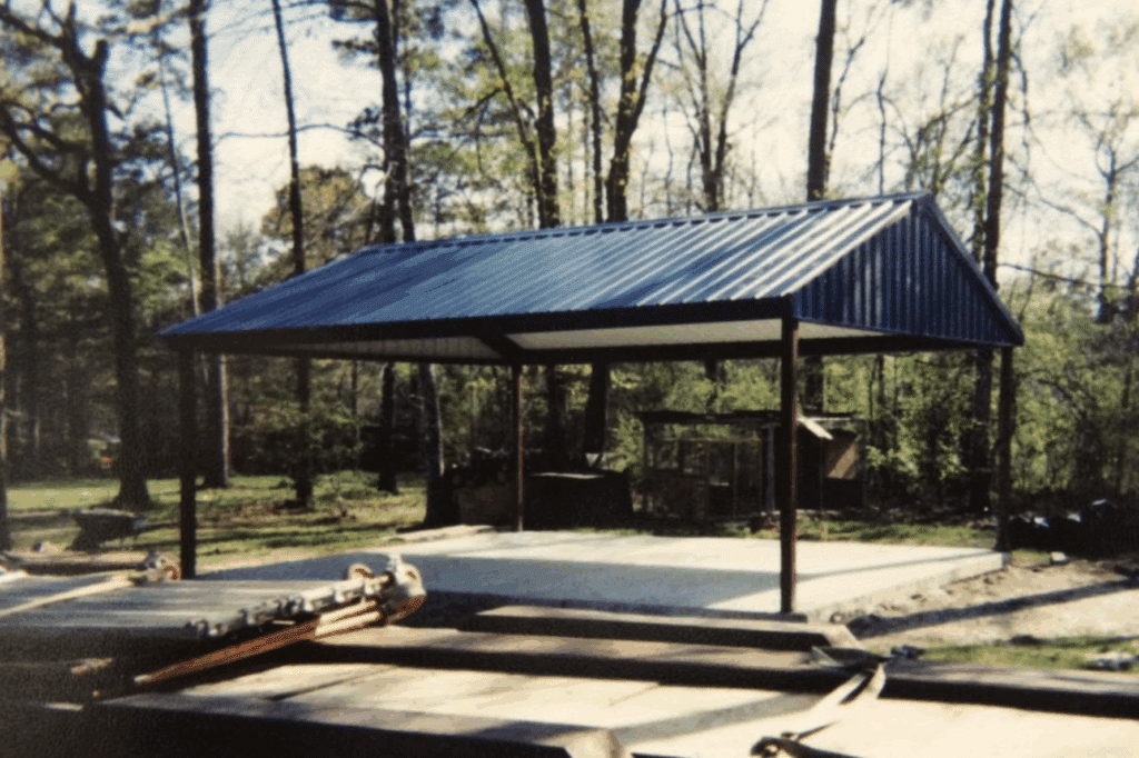 building in a forest shows off metal roofing walker la residents choose for their property